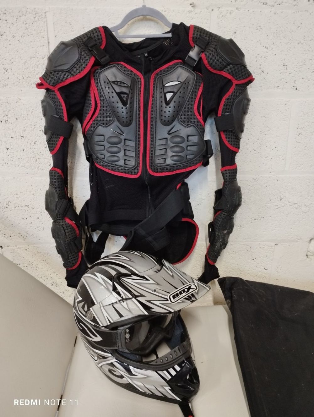 Lot 302: Motorcross Body Armor and Helmet. GP-Pro Body Armour...