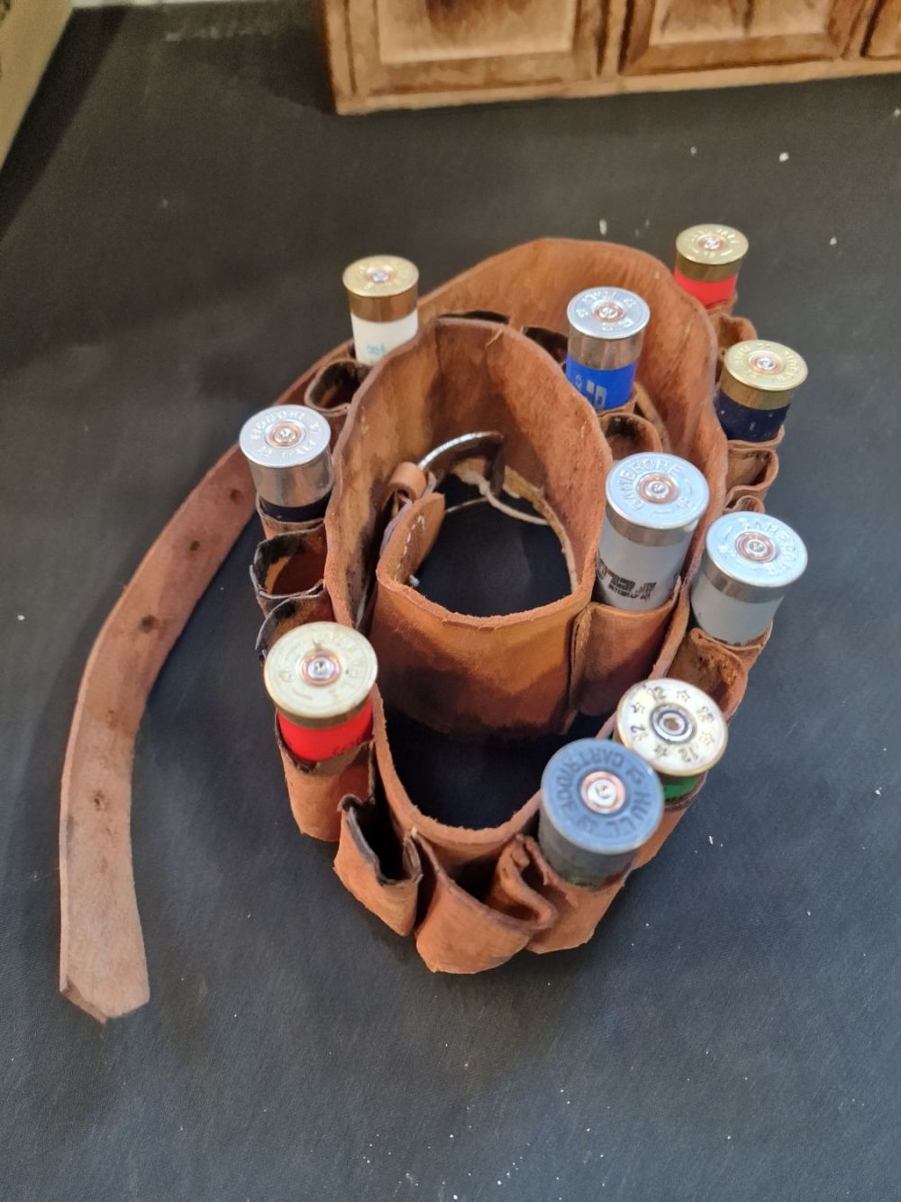 Lot 305: Vintage Shot gun leather belt with empty cartridges
