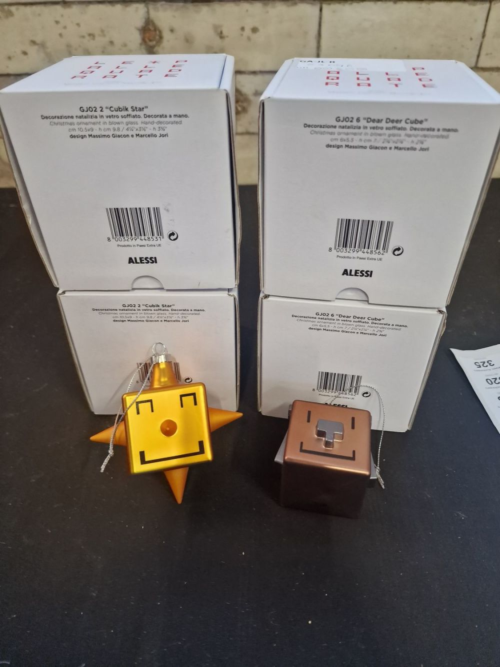 Lot 310: Two Alessi Manor Christmas Cubik star decorations and...