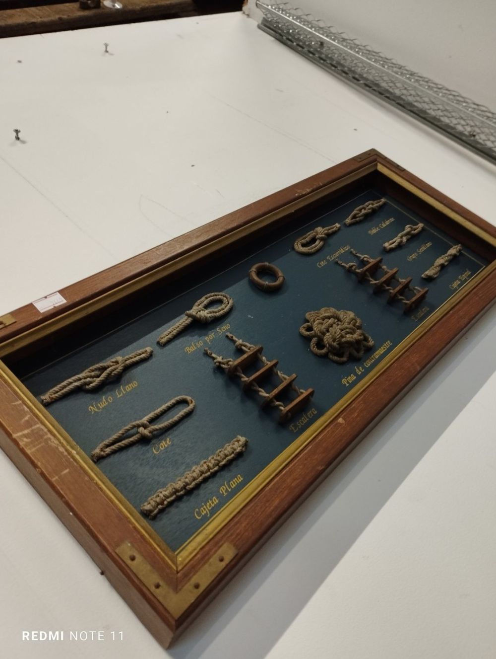 Lot 321: Framed Nautical Decorative Knot Board. Approx. 56x24cm