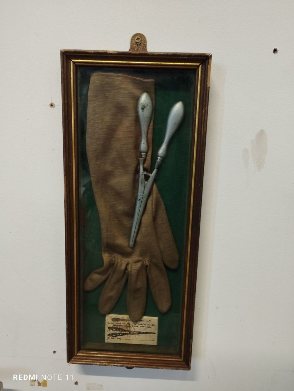 Lot 323: Vintage Glove and Glove Stretchers Framed Display. Approx....