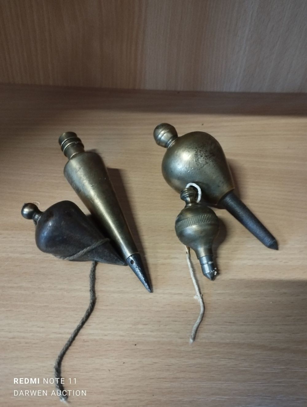 Lot 371: Four Vintage Brass Plumb Bobs
