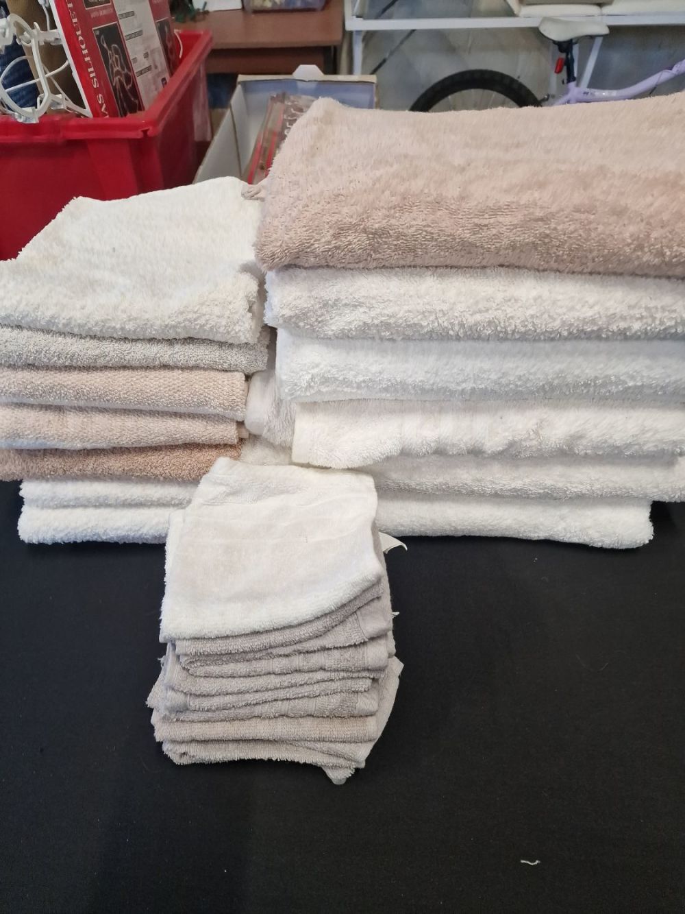 Lot 380: A collection of large Bath towels, flannels and...