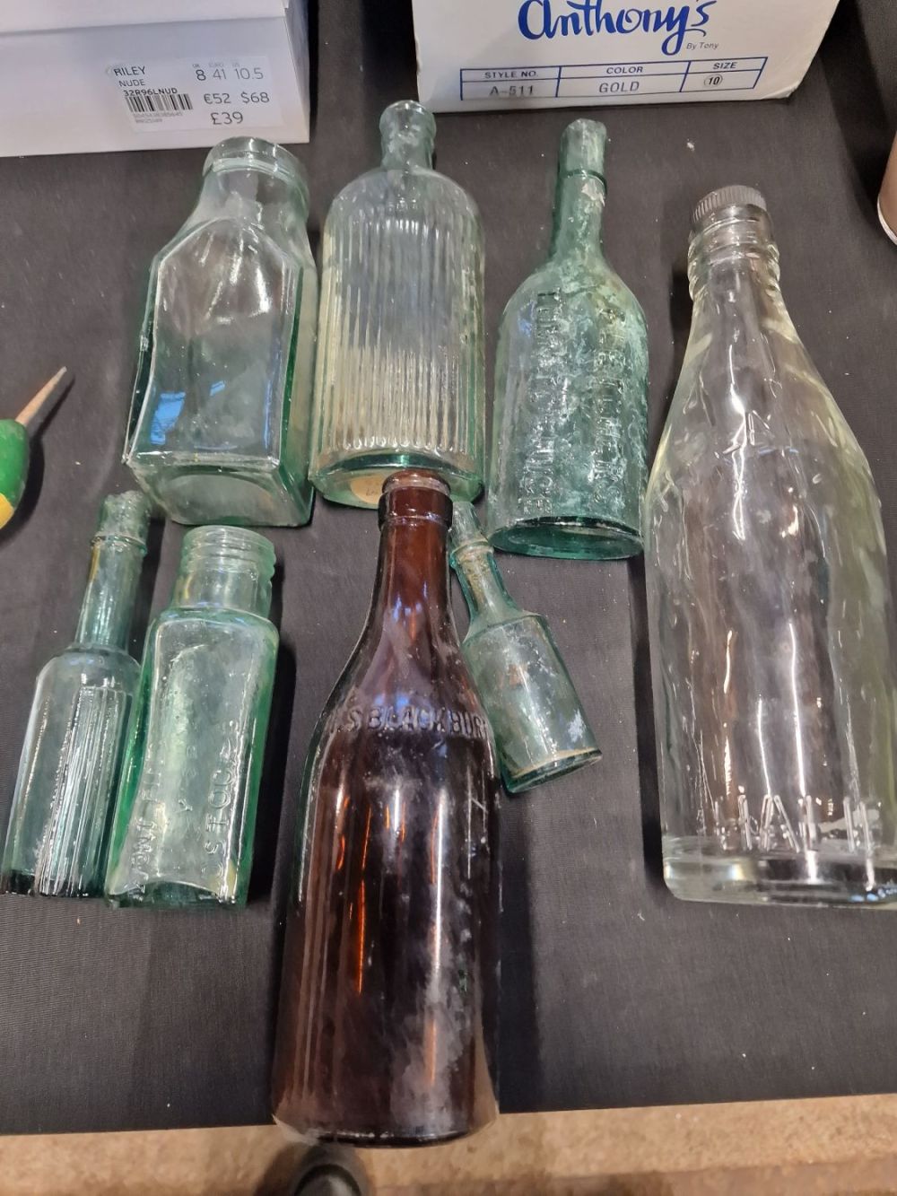 Lot 413: Collection of vintage glass bottles. Includes Duttons of...