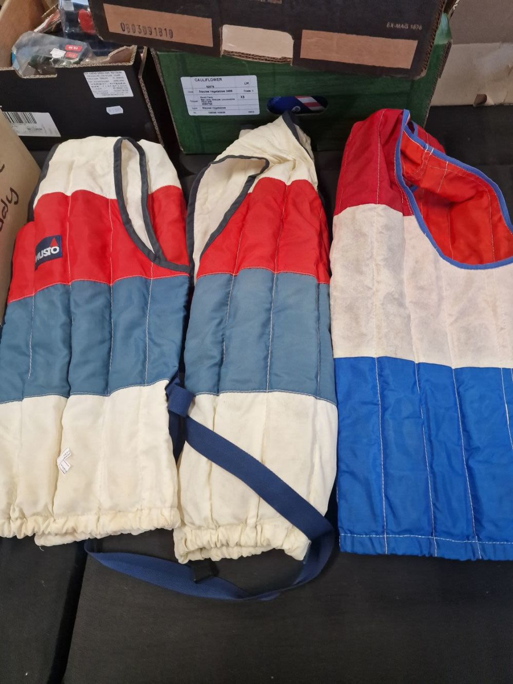 Lot 174: Three buoyancy aids adults or children's