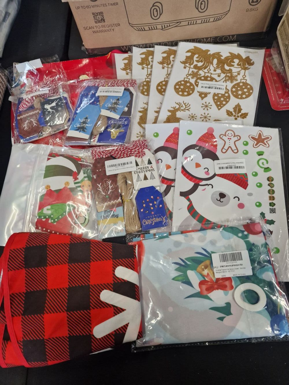 Lot 194: A bundle of Christmas decorations includes, wall tapestry,...