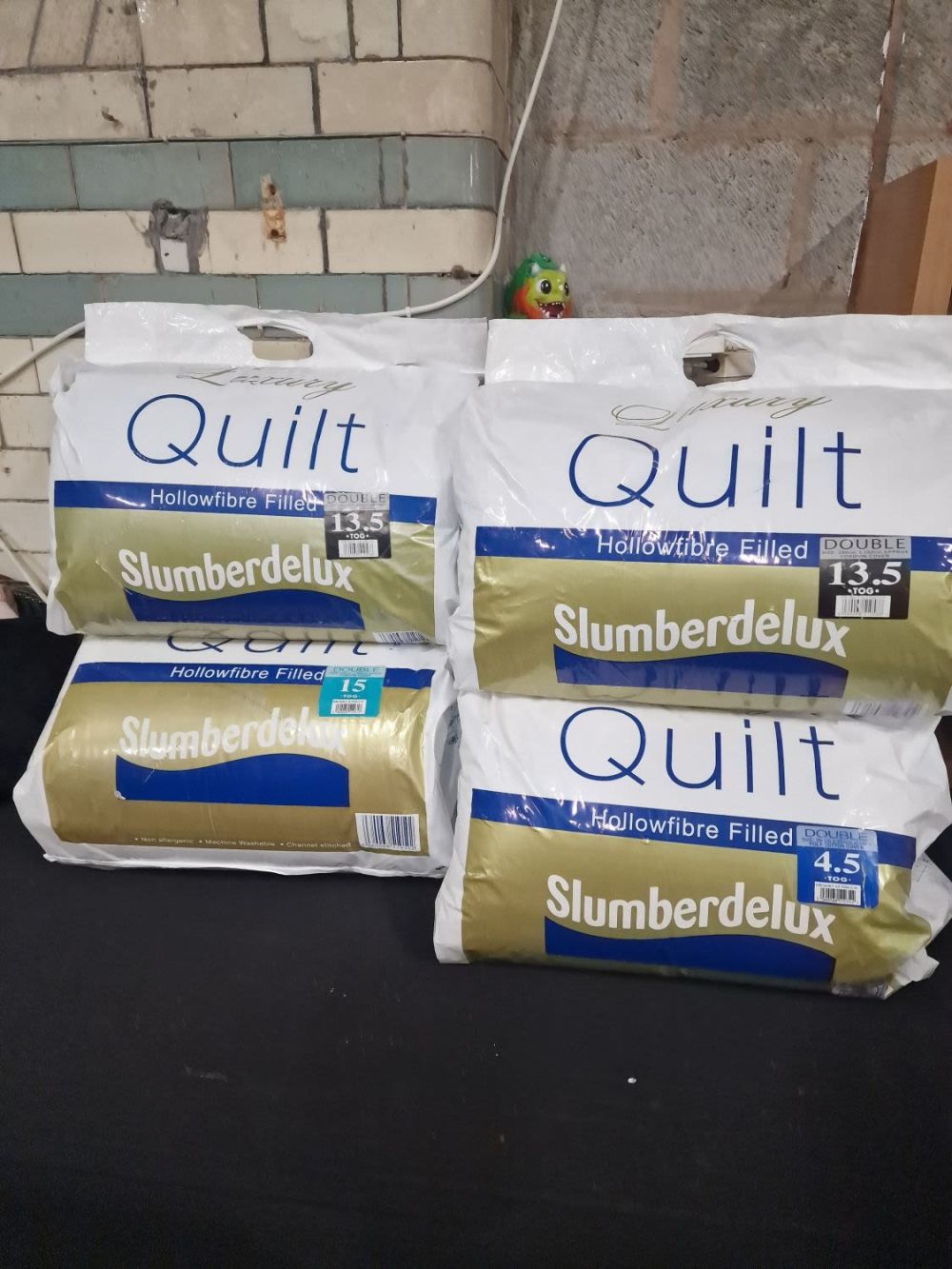 Lot 350: Four double luxury hollow fibre slumber delux brand...