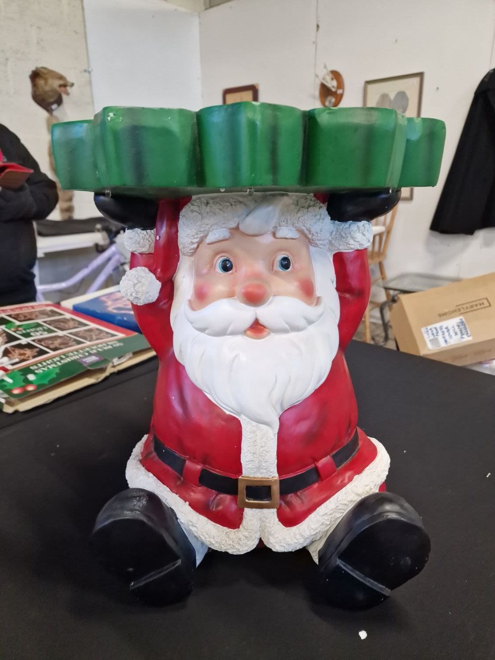 Lot 377: Father Christmas light up solid wood table