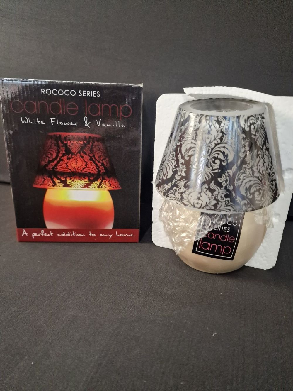 Lot 7: A brand new Rococo Series Candle Lamp. White...