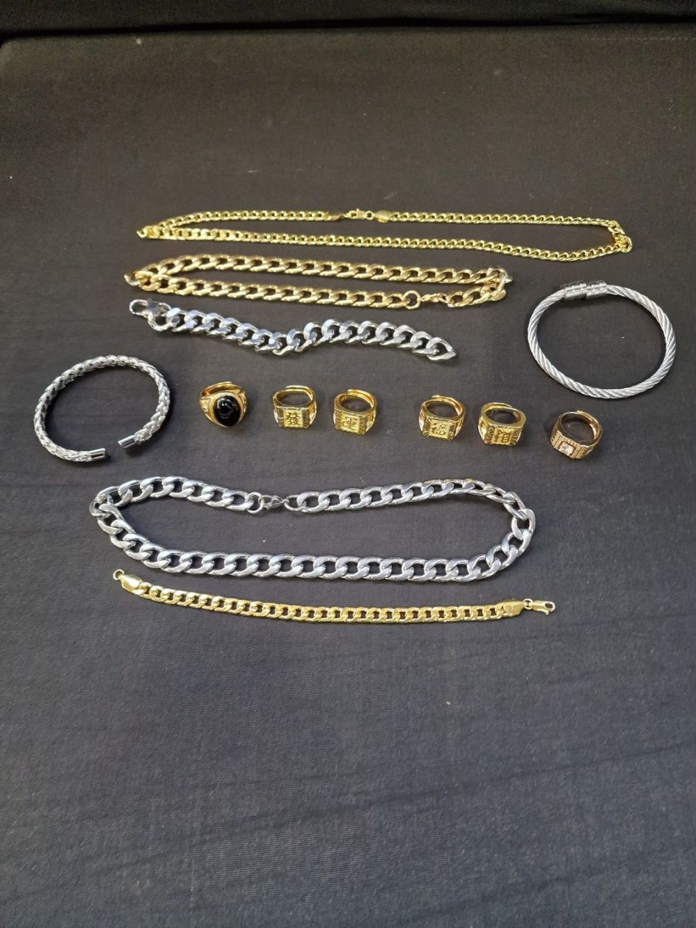 Lot 11: A bundle of mens costume jewellery