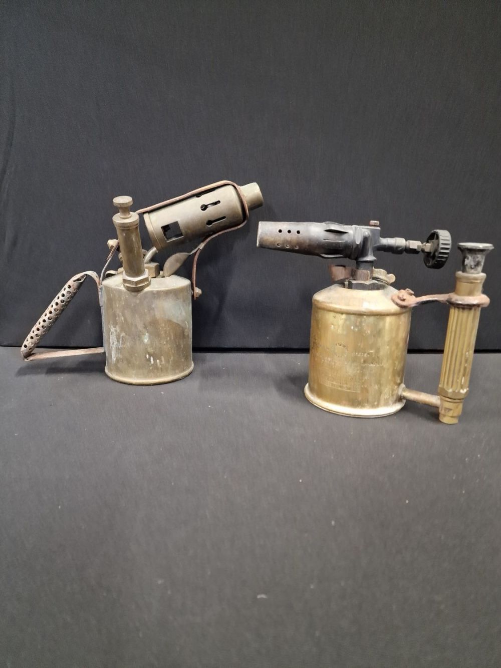 Lot 88: Two vintage brass blow torch lamps. Includes Stockholm...