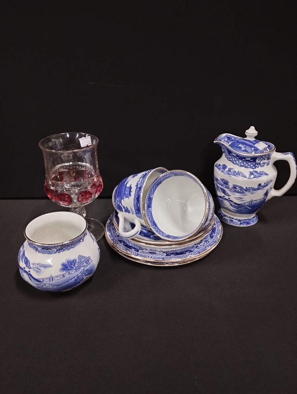Lot 102: Selection of Ringtons Willow Pattern Design by Wade...