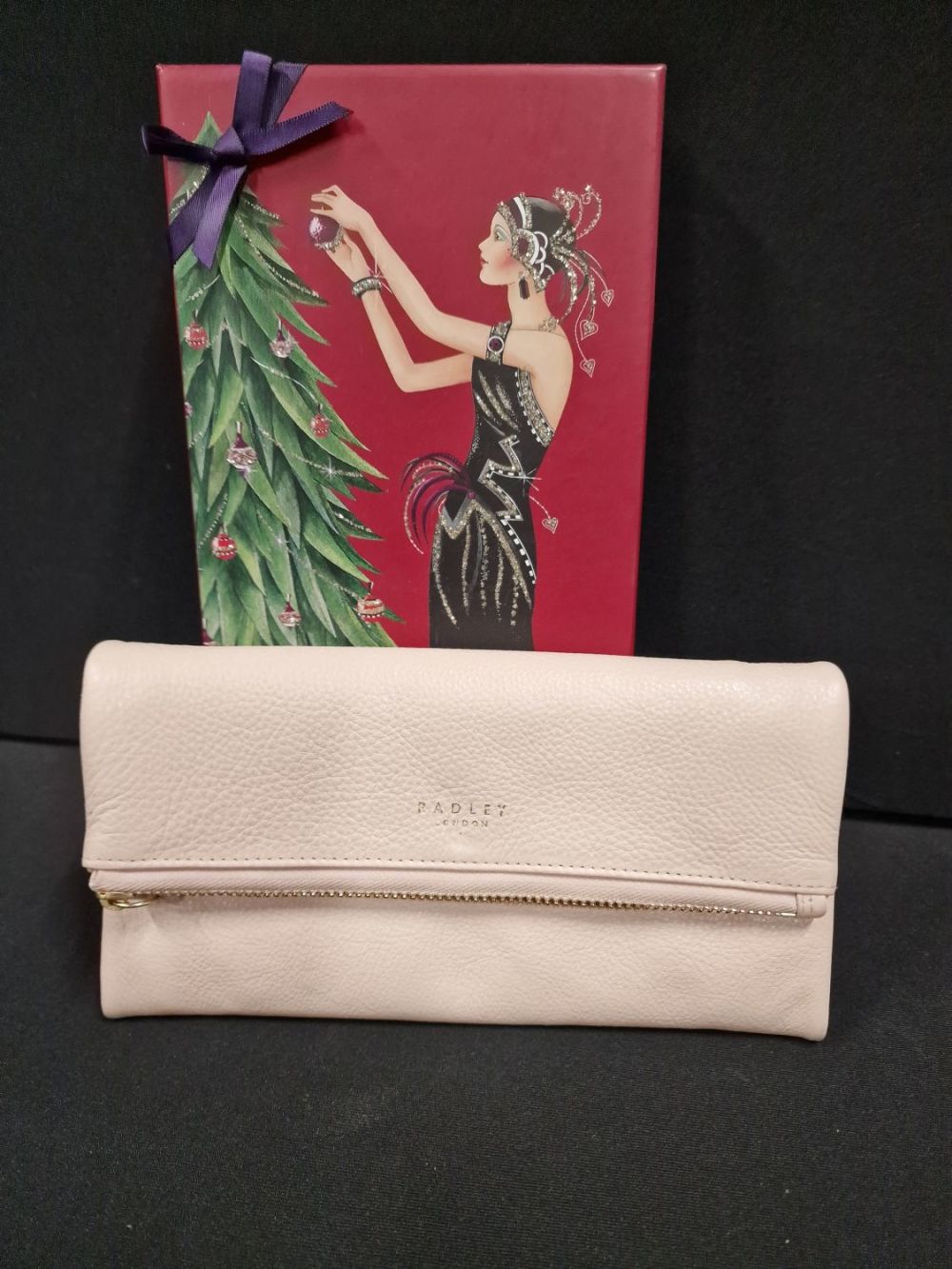 Lot 106: Like new pastel pink Radley purse