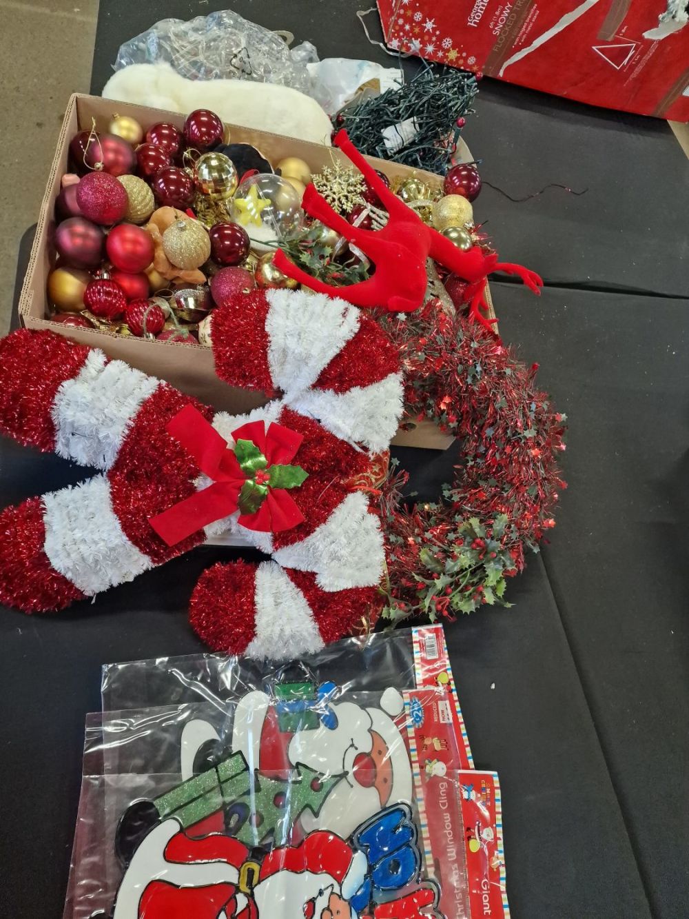 Lot 117: A large Bundle of Chrsitmas decorations red, gold...