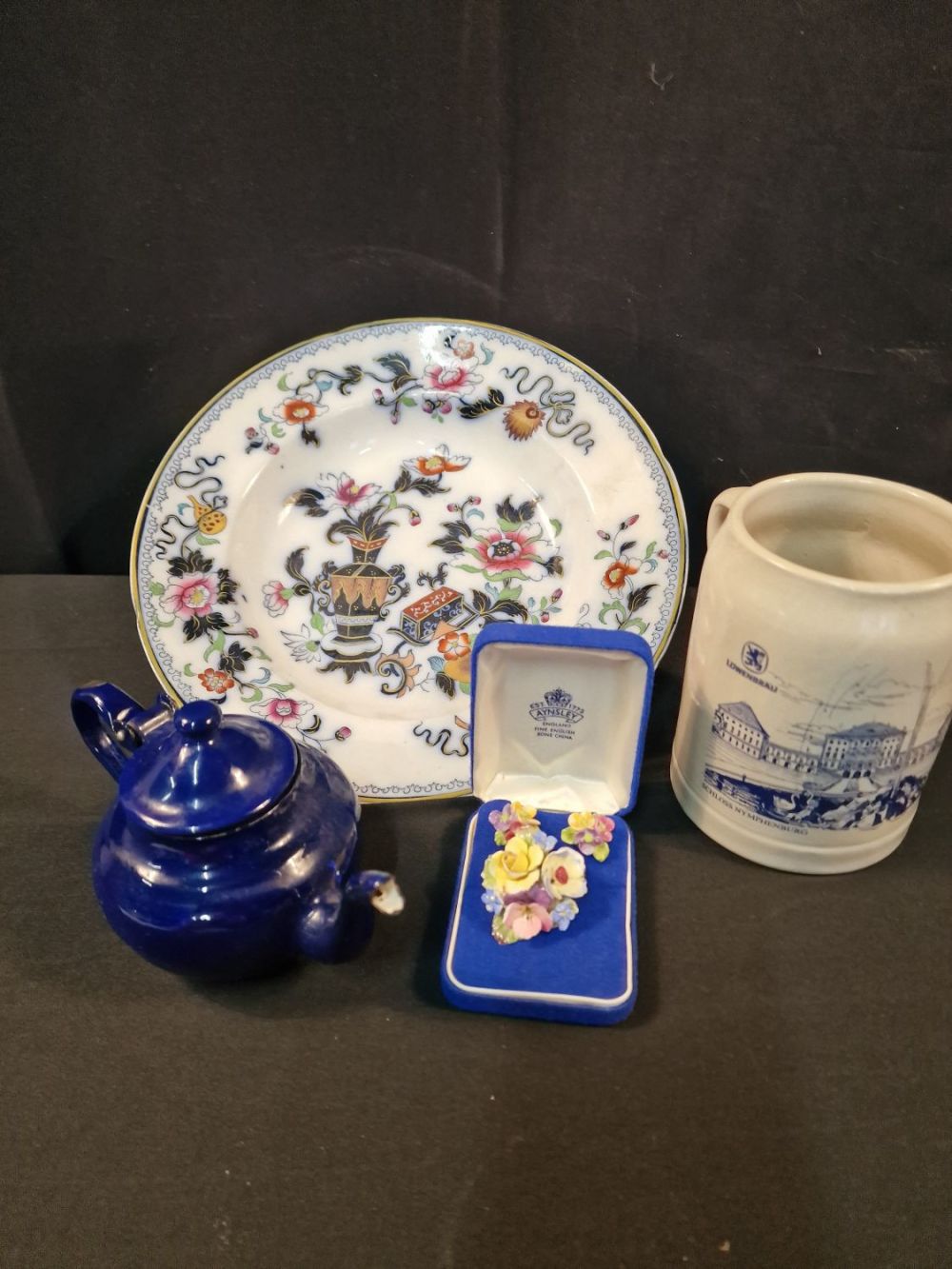 Lot 122: A collection of vintage items. Includes.coalbolt blue one...