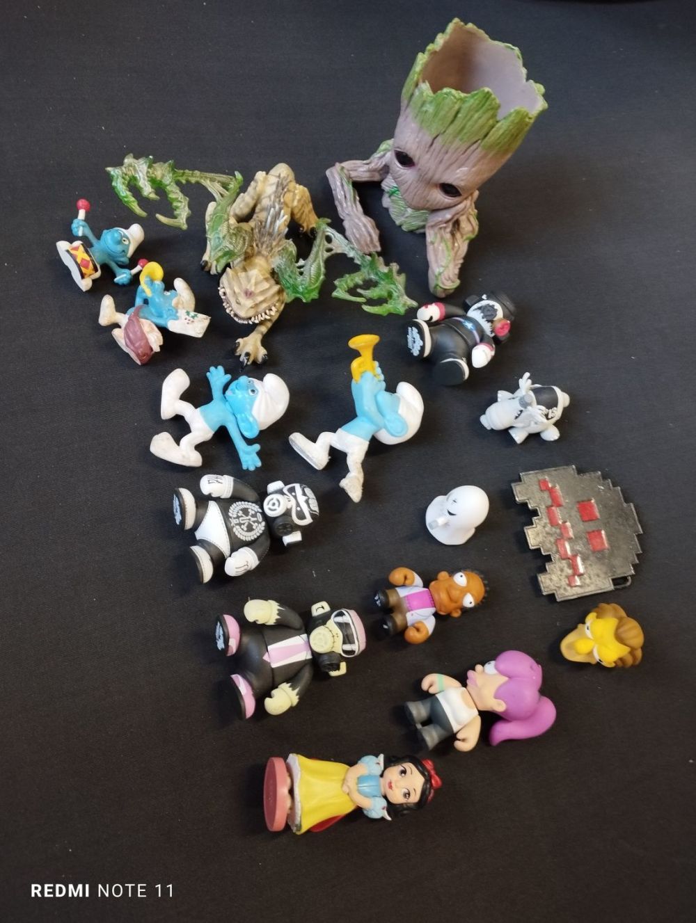 Lot 173: Selection of Toy Figures and a Belt Buckle...