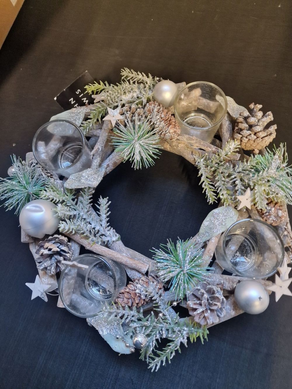 Lot 191: John Lewis wooden Christmas table centre piece.