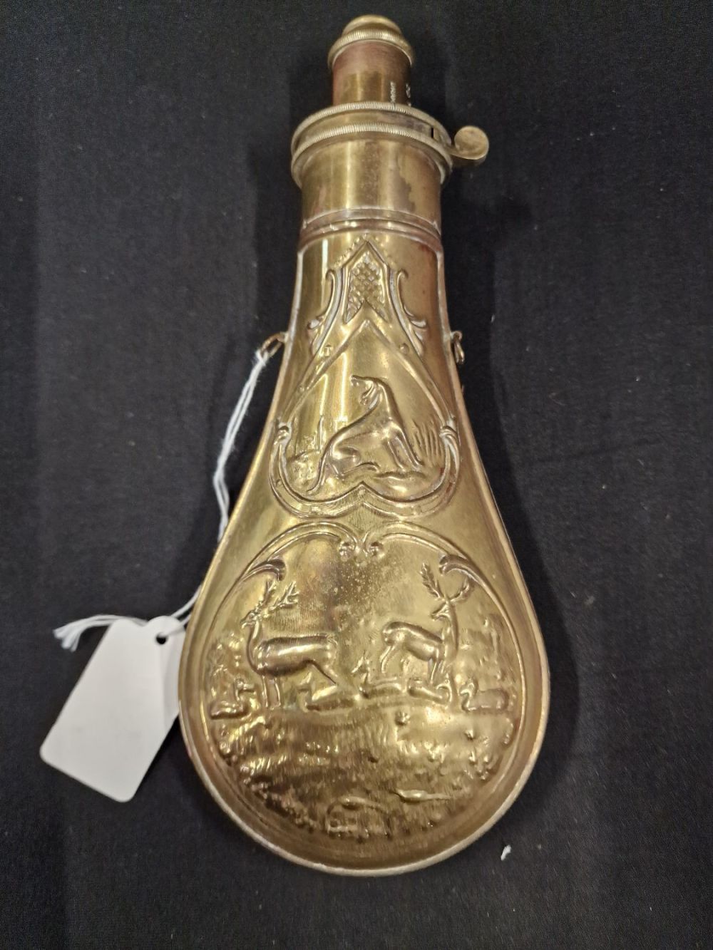 Lot 229: Brass on copper powder flask horn bottle for...