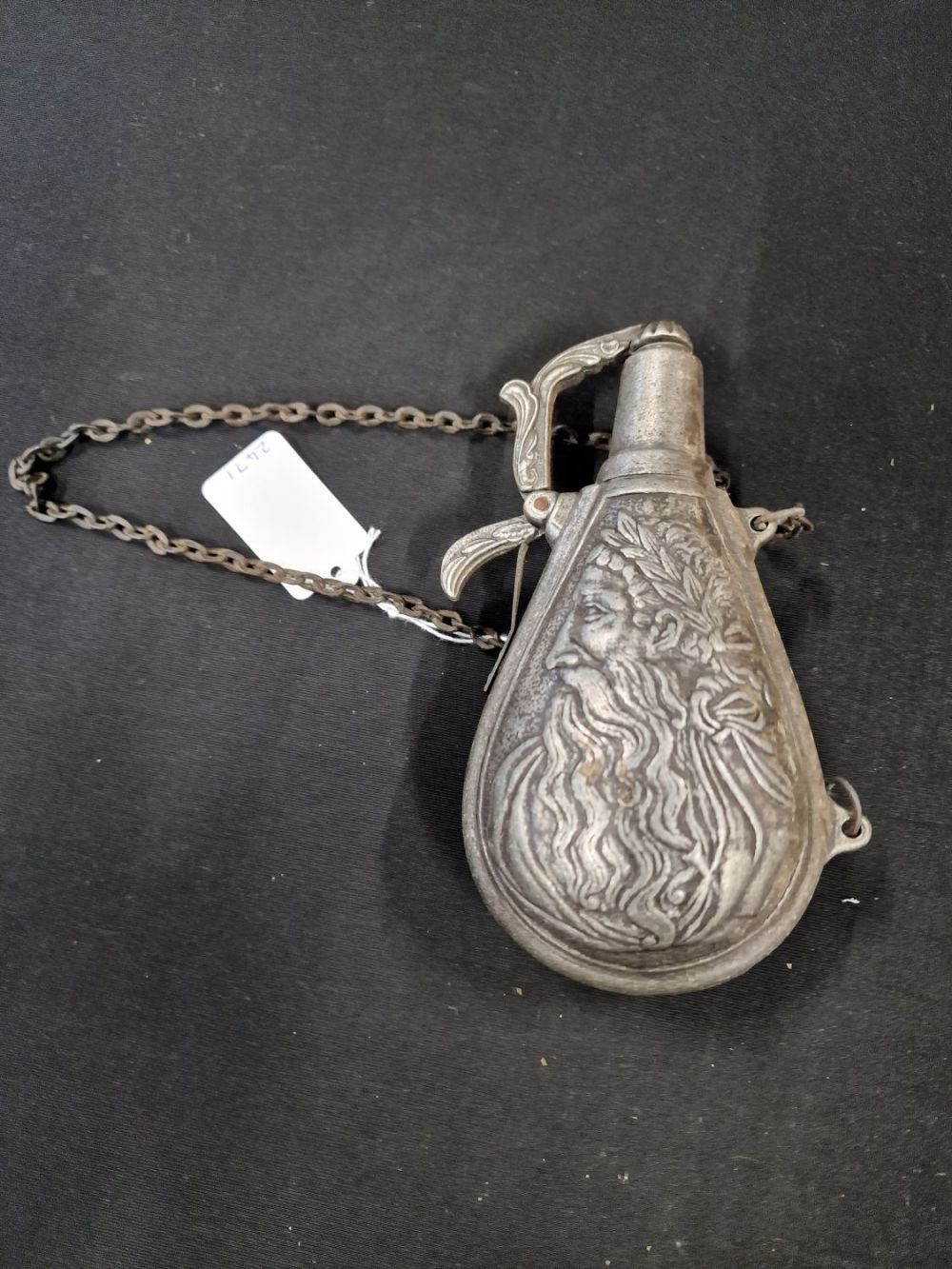 Lot 231: Vintage Pewter powder bottle for a rifle. Lady...