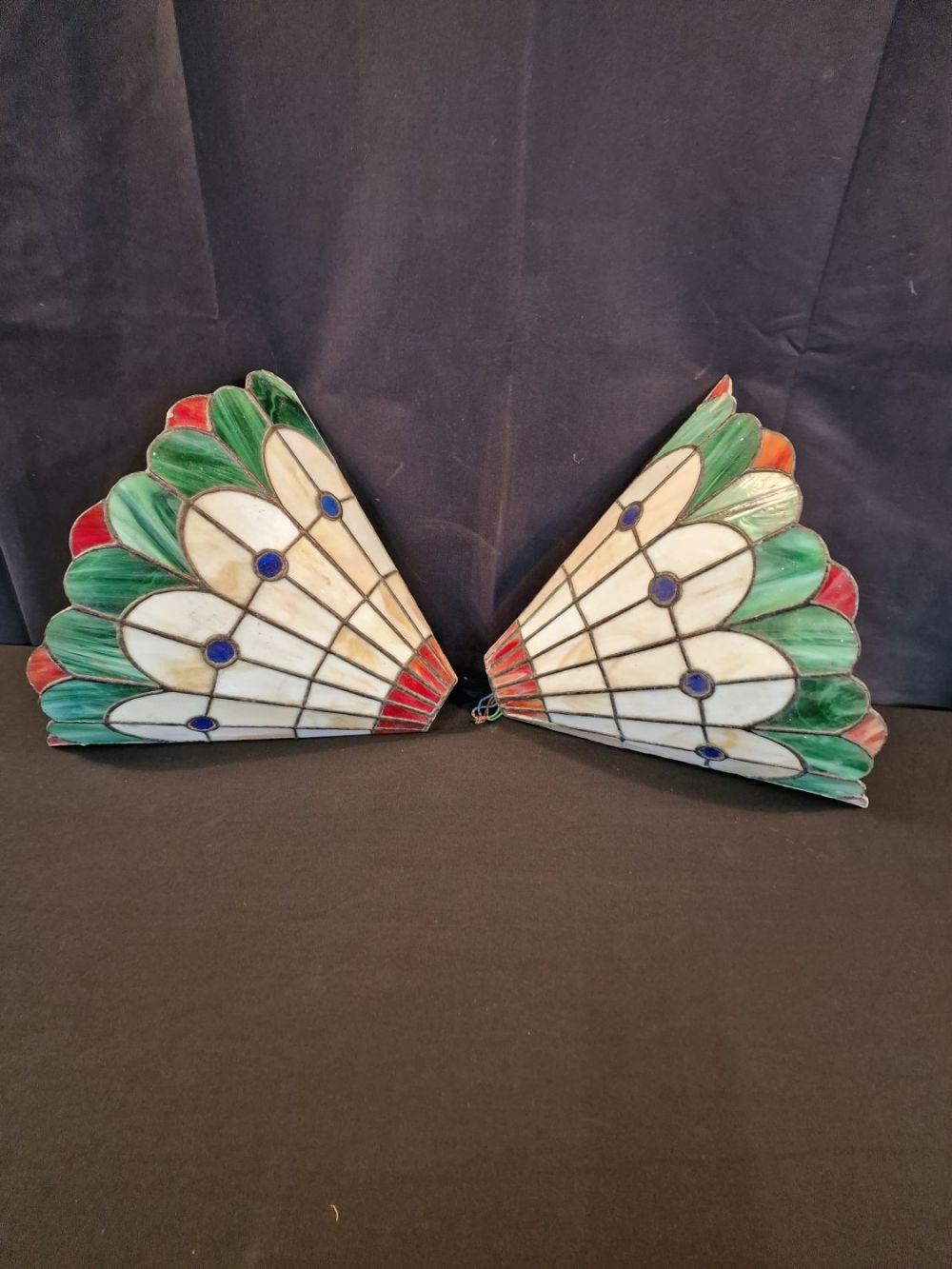Lot 233: A pair of Tiffany style wall lamps, double...