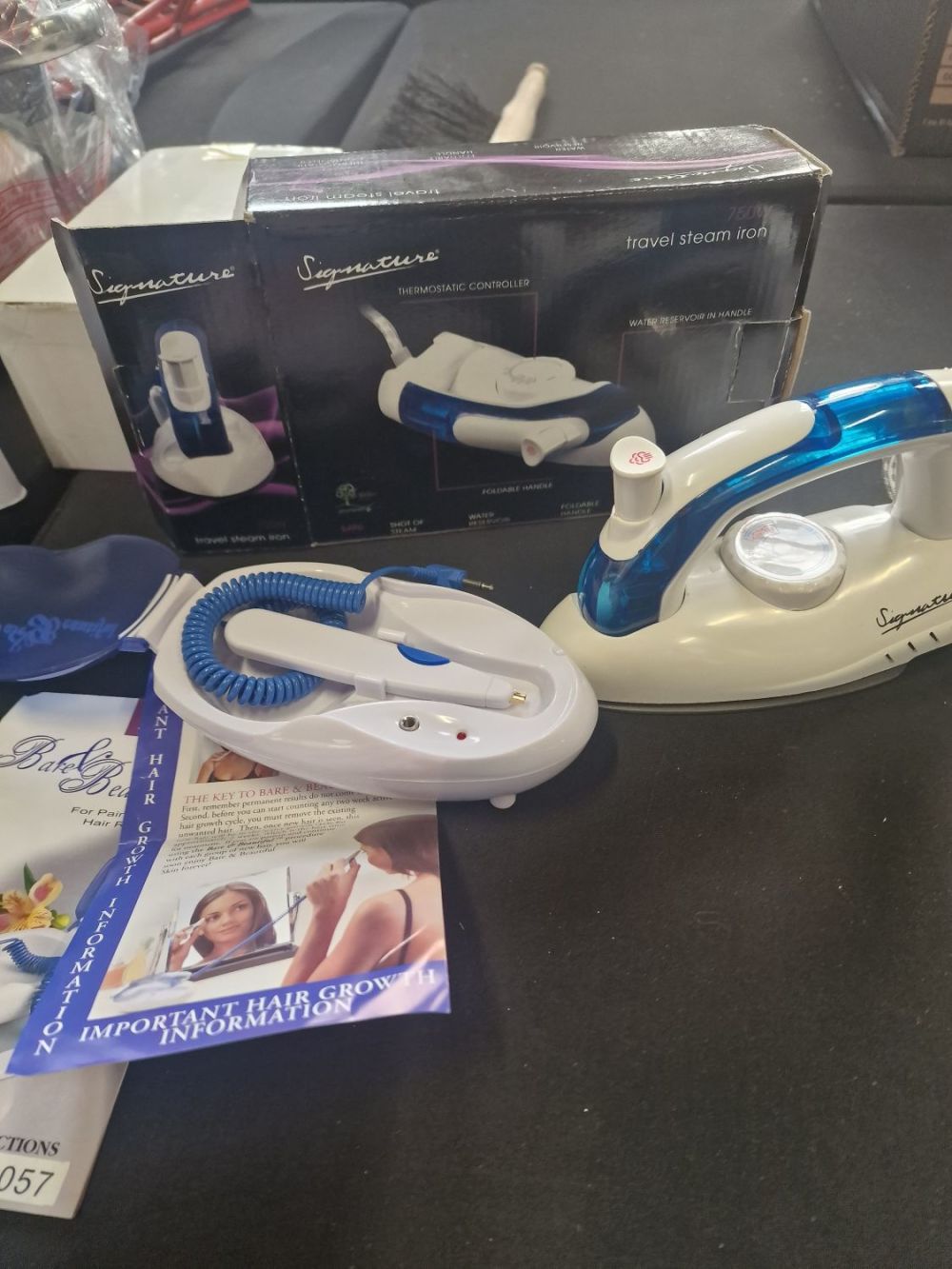Lot 257: Feminine electric hair remover and signature 750 foldable...