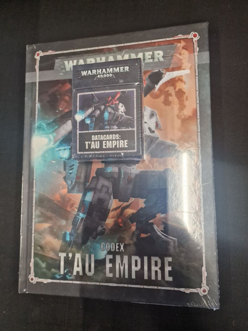 Lot 281: Codex,.Warhammer T'au Empire brand new supplement and data...
