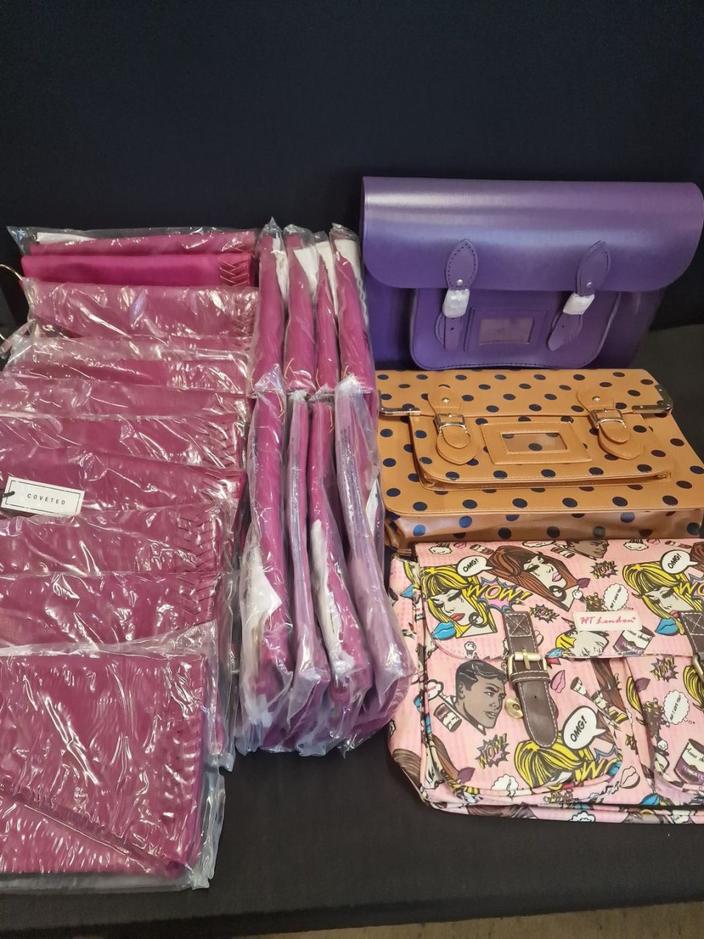 Lot 292: A quality of brand new ladies handbags and...