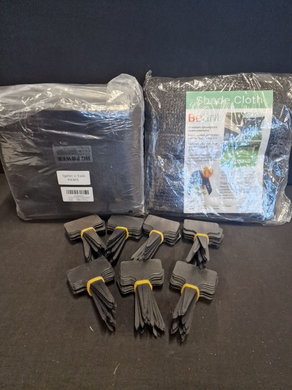 Lot 302: A collection of plant accessories includesnShade cloth, 5pc...