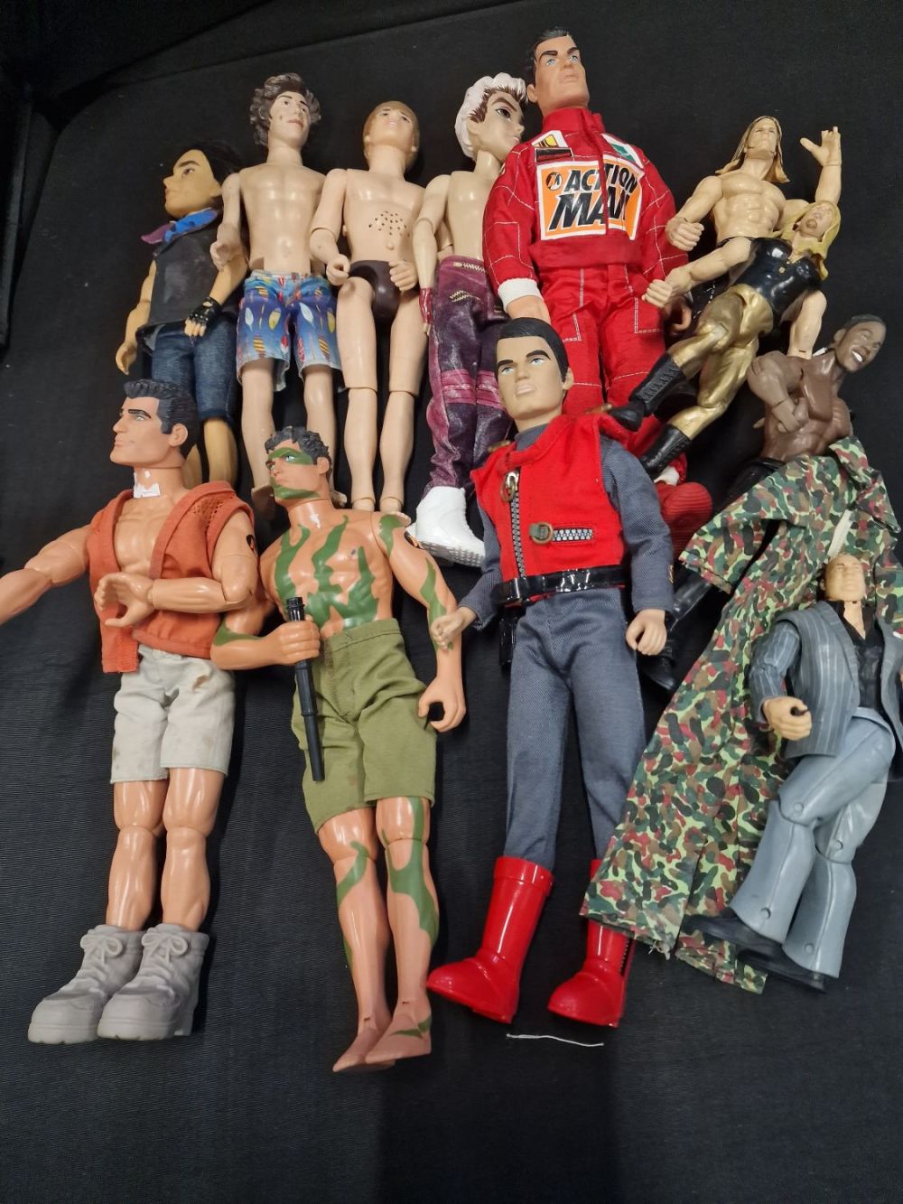 Lot 313: A collection of Action Man figures and others.