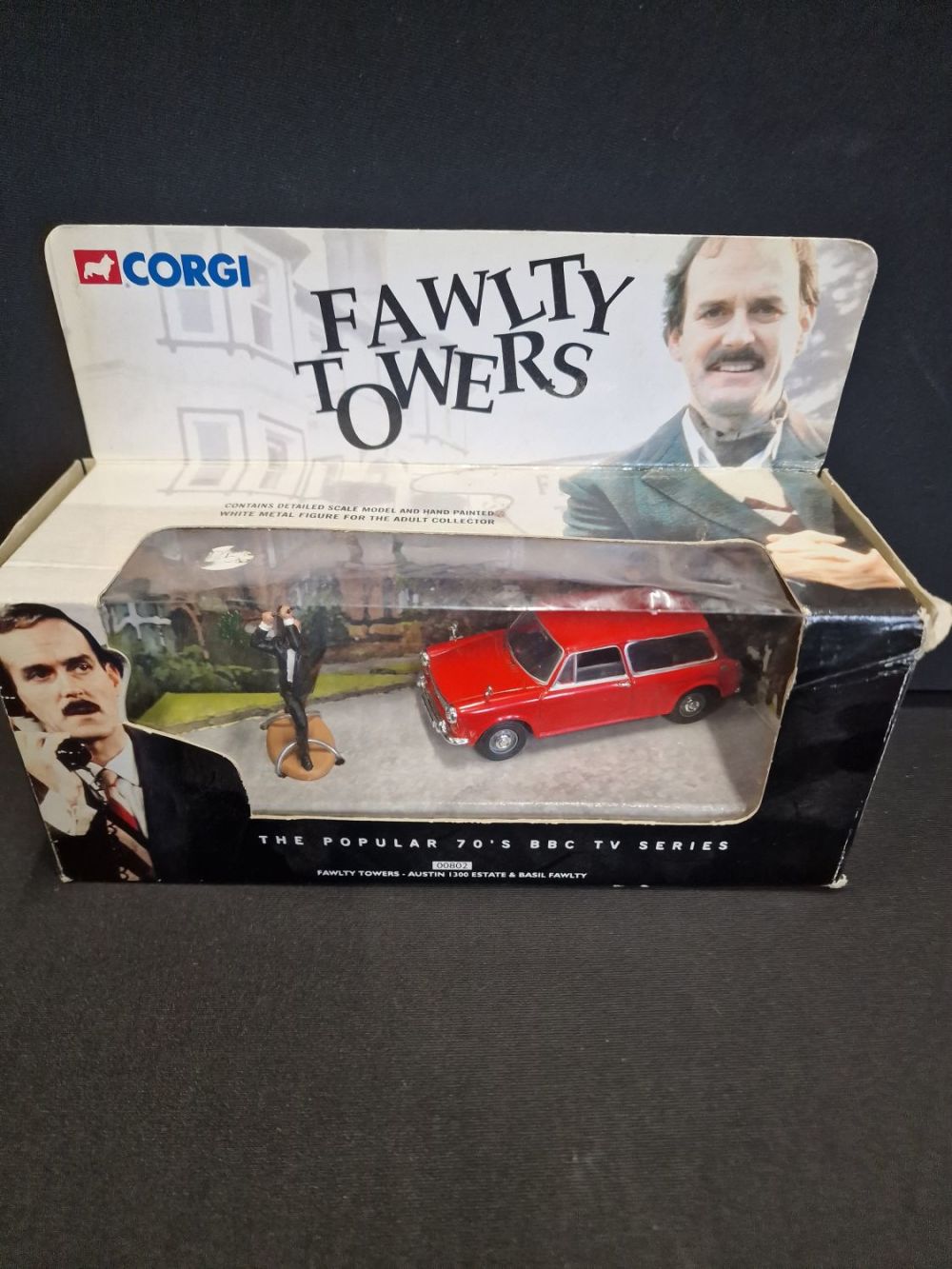 Lot 326: Corgi Faulty Tower Austin 130p Estate & Basil...