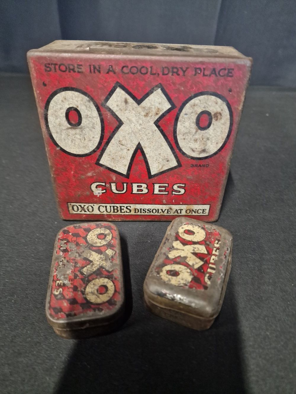 Lot 353: Three vintage OXO cube tins