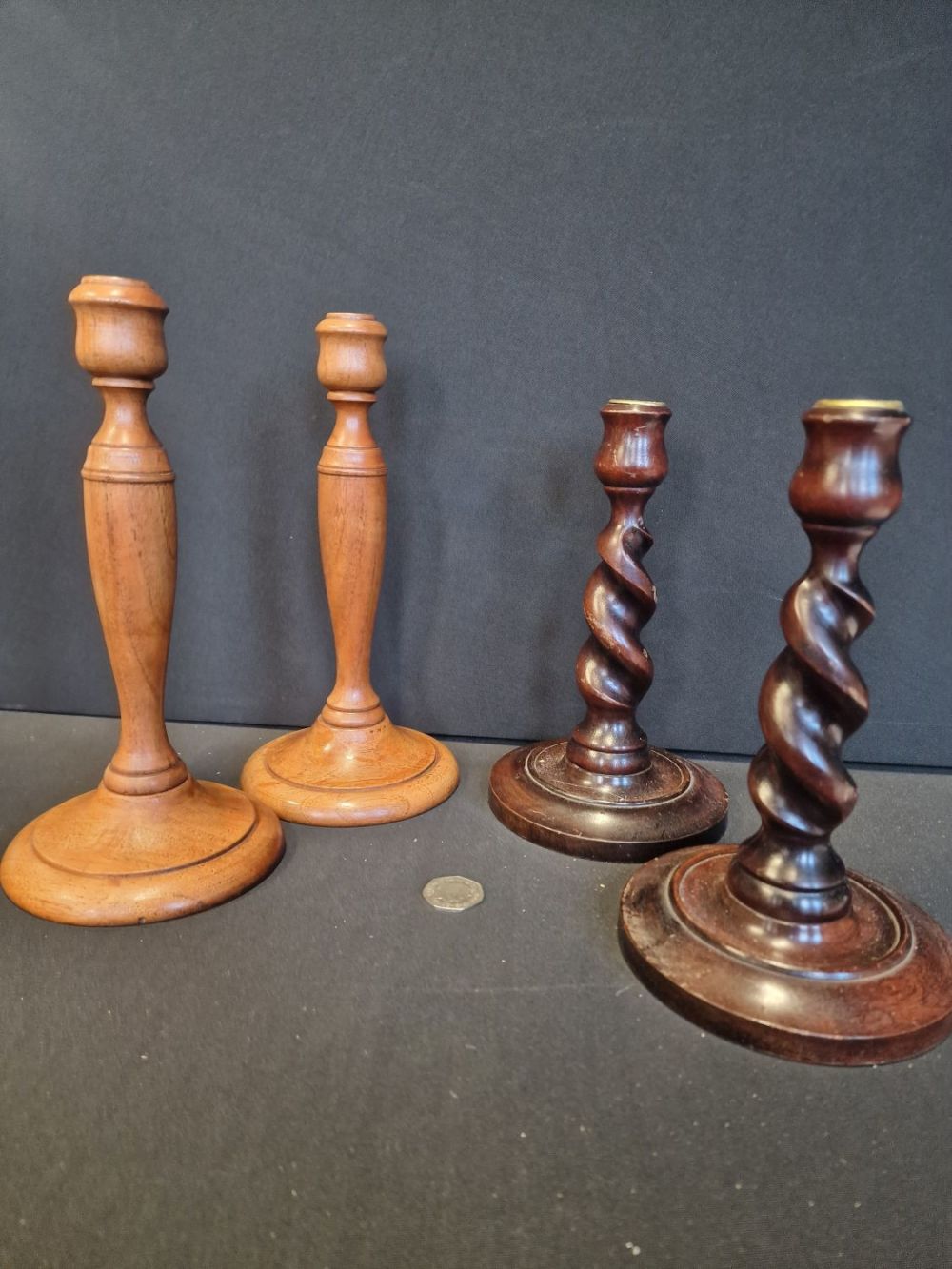Lot 232: Two pairs of oak candles. One with Barley...