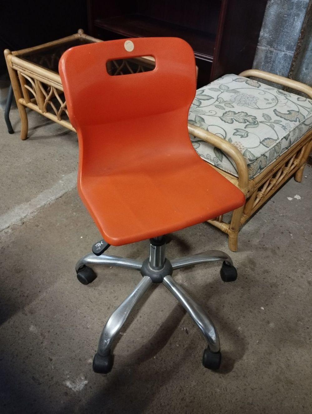 Lot 242: Titan Swivel Chair in Orange