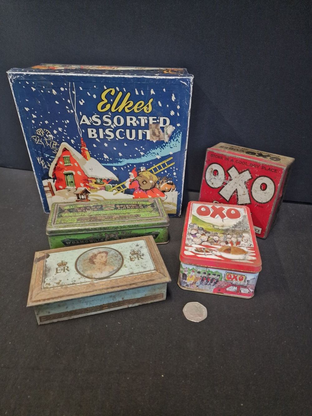Lot 255: A selection of vintage tins. Includes Elkes assorted...