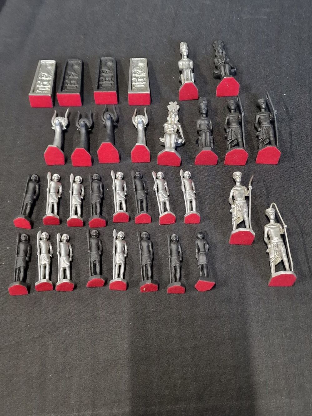 Lot 278: A collection of Egyptian cast metal themed chess...