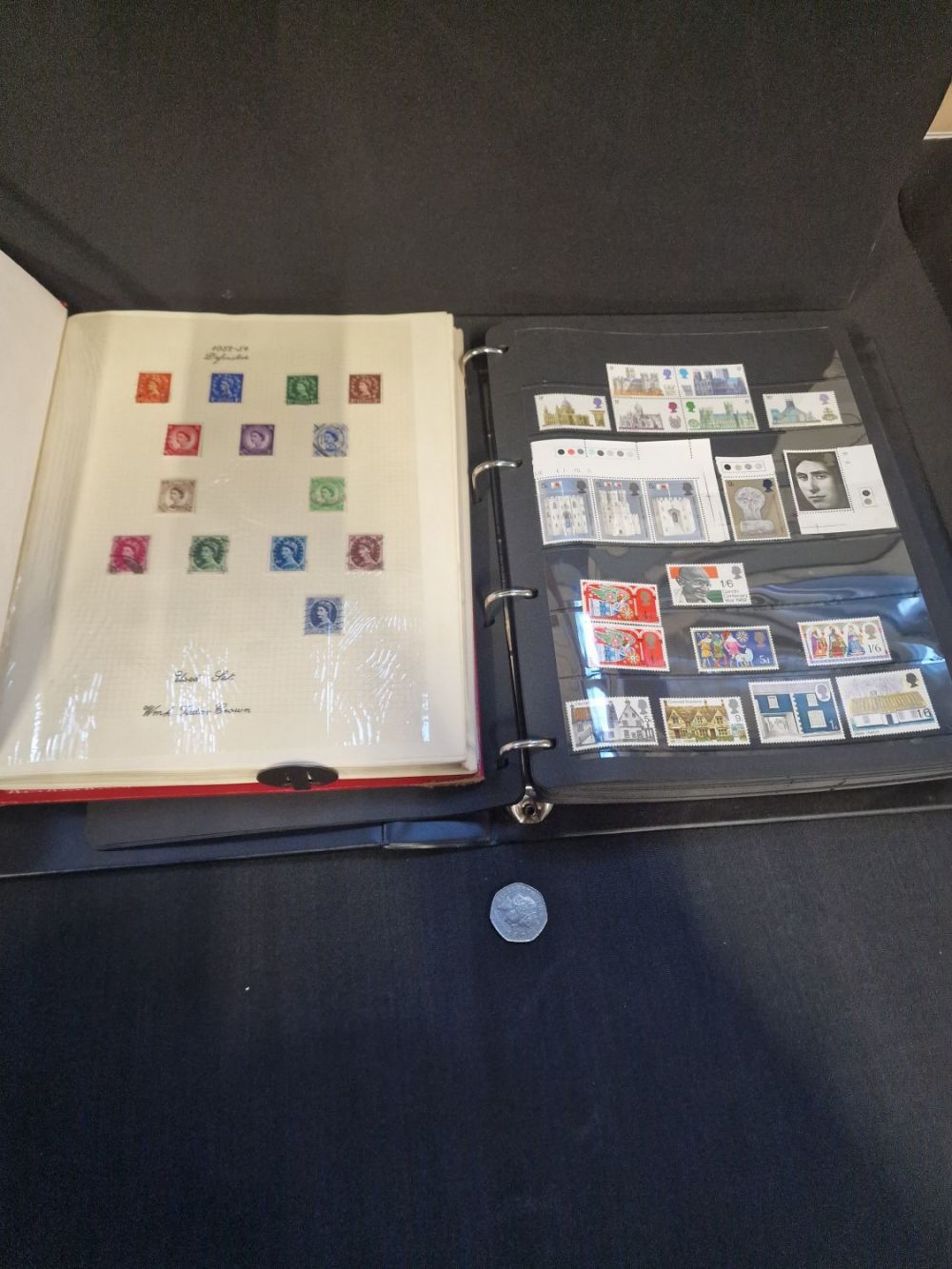Lot 357: Two Great Britain stamp albums with some.mint, used...