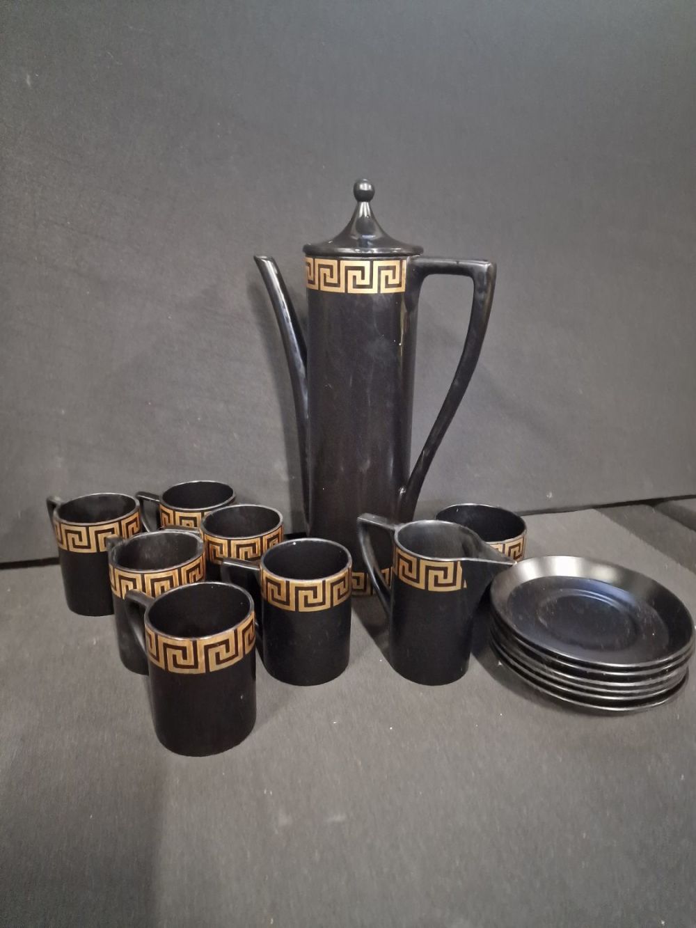 Lot 359: A collection of Portmeirion Black and Gold designed...