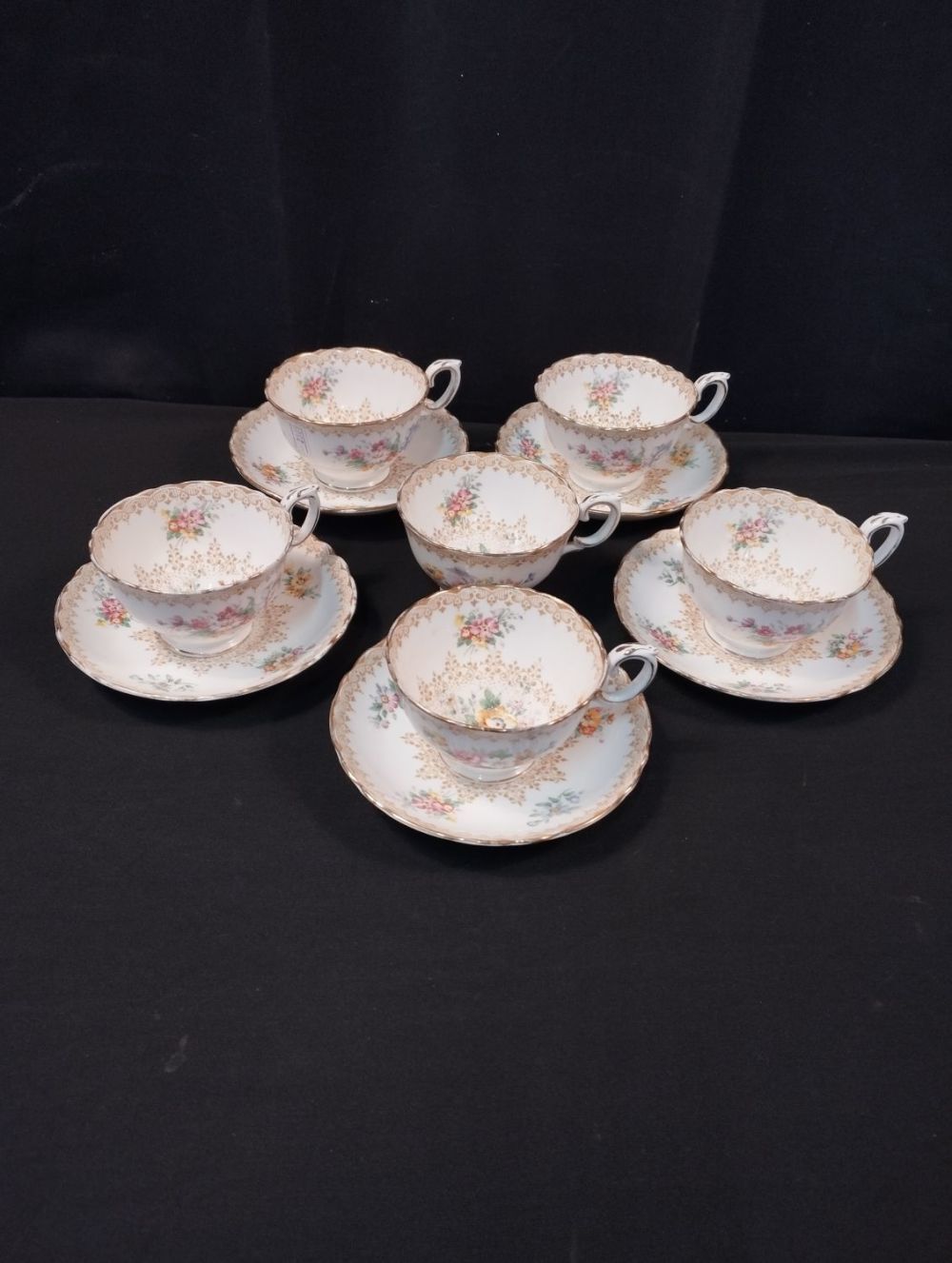 Lot 361: Vintage Crown Bone China Cups and Saucers