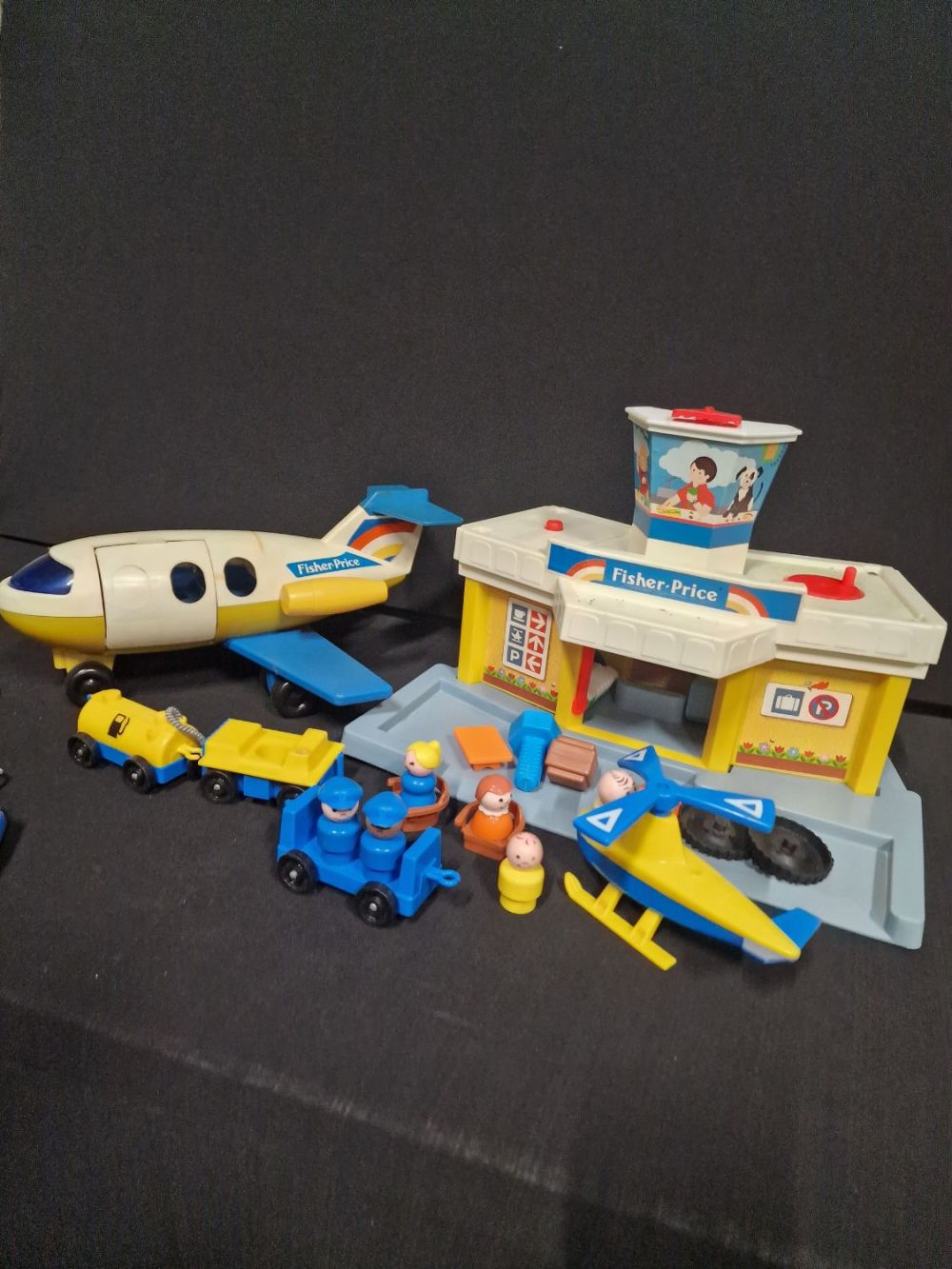Lot 378: Vintage Fisher Price Airport and aeroplane. With little...