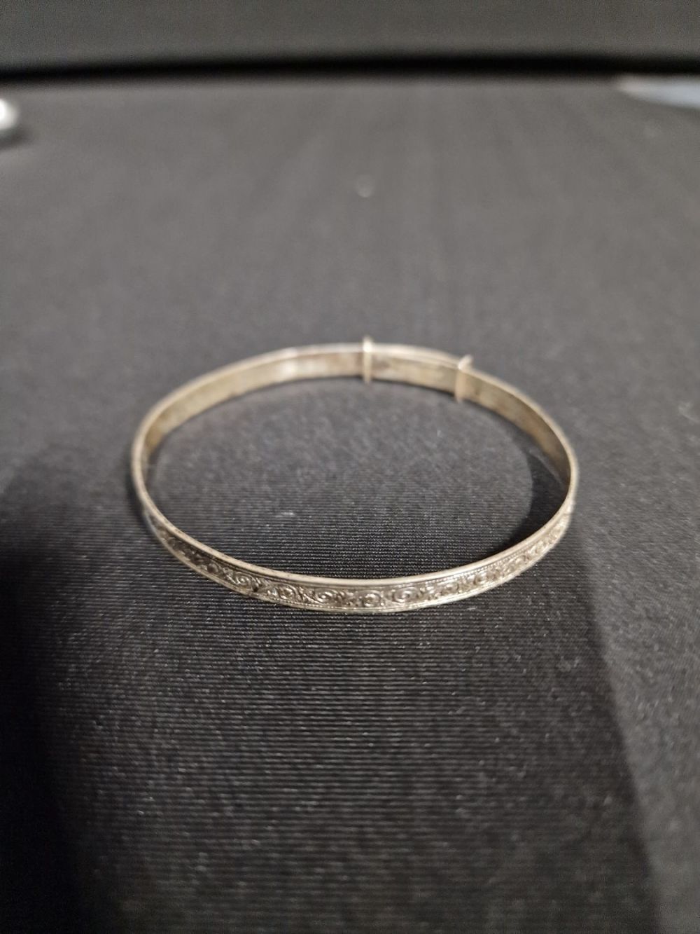 Lot 394: Sterling silver children's bangel