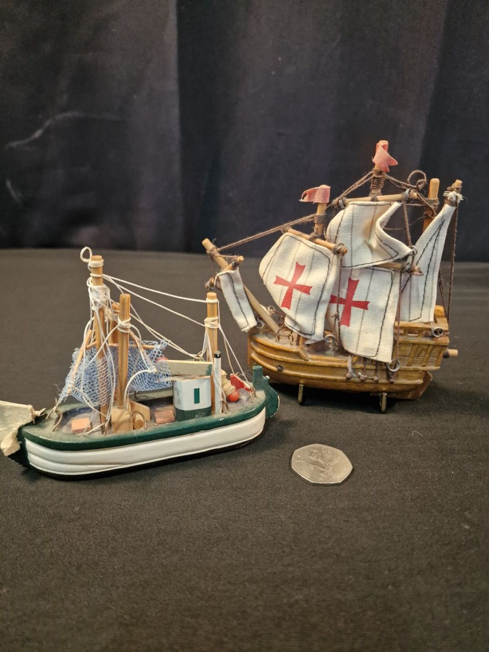 Lot 108: A mini wooden Santa Maria model ship and...