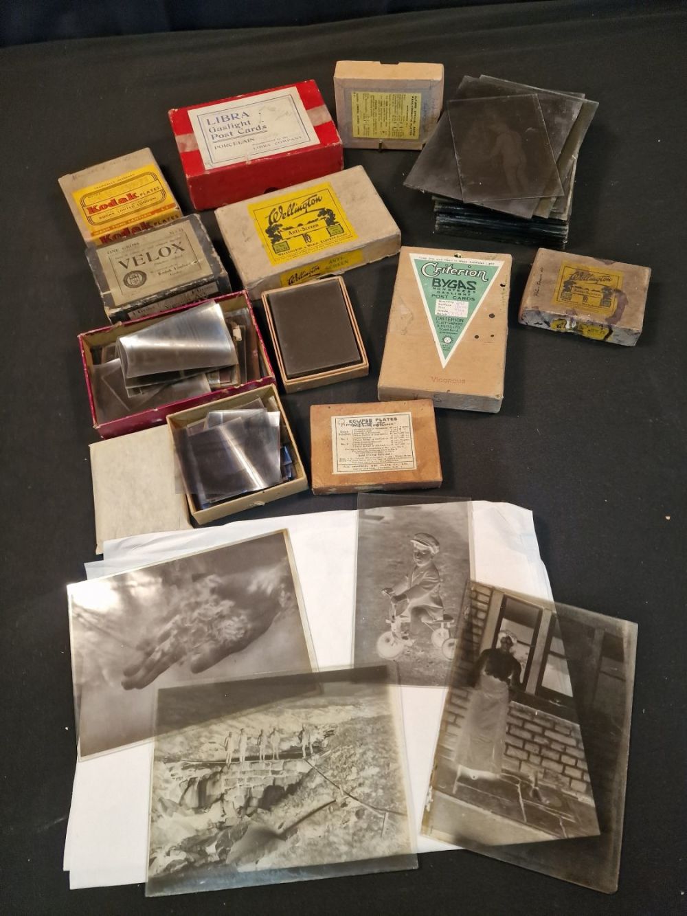 Lot 112: A large collection of vintage uaed glass plate...