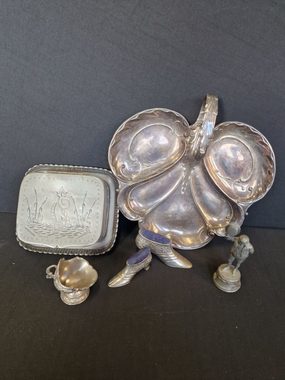 Lot 158: A collection of silver plate and pewter items....