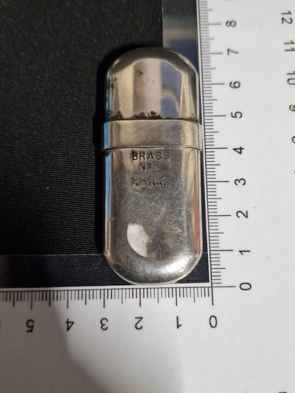 Lot 169: A vintage lighter Brass No.5 Kingsway