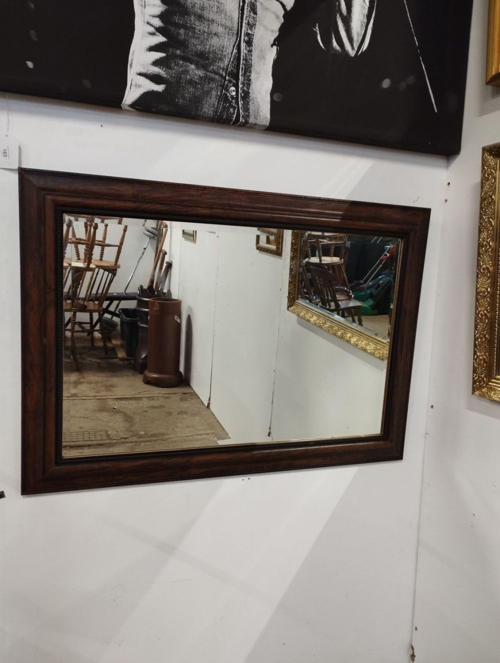 Lot 192: Wooden Framed Wall Hanging Mirror. Approx. 100x70cm.