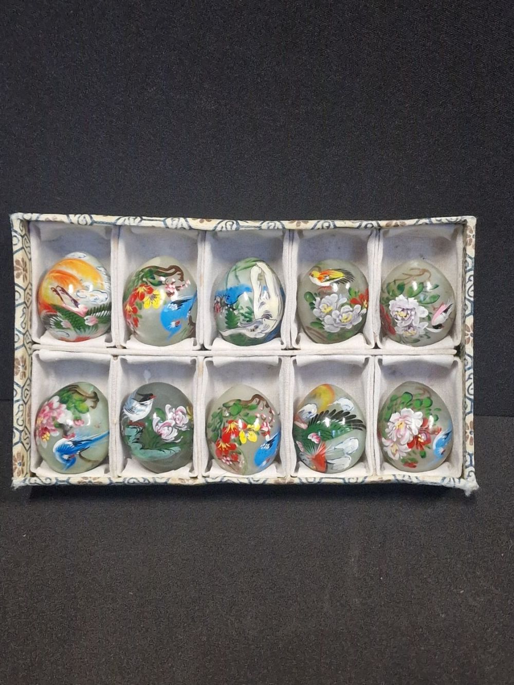 Lot 196: A collection of oriental individual hand painted jade...