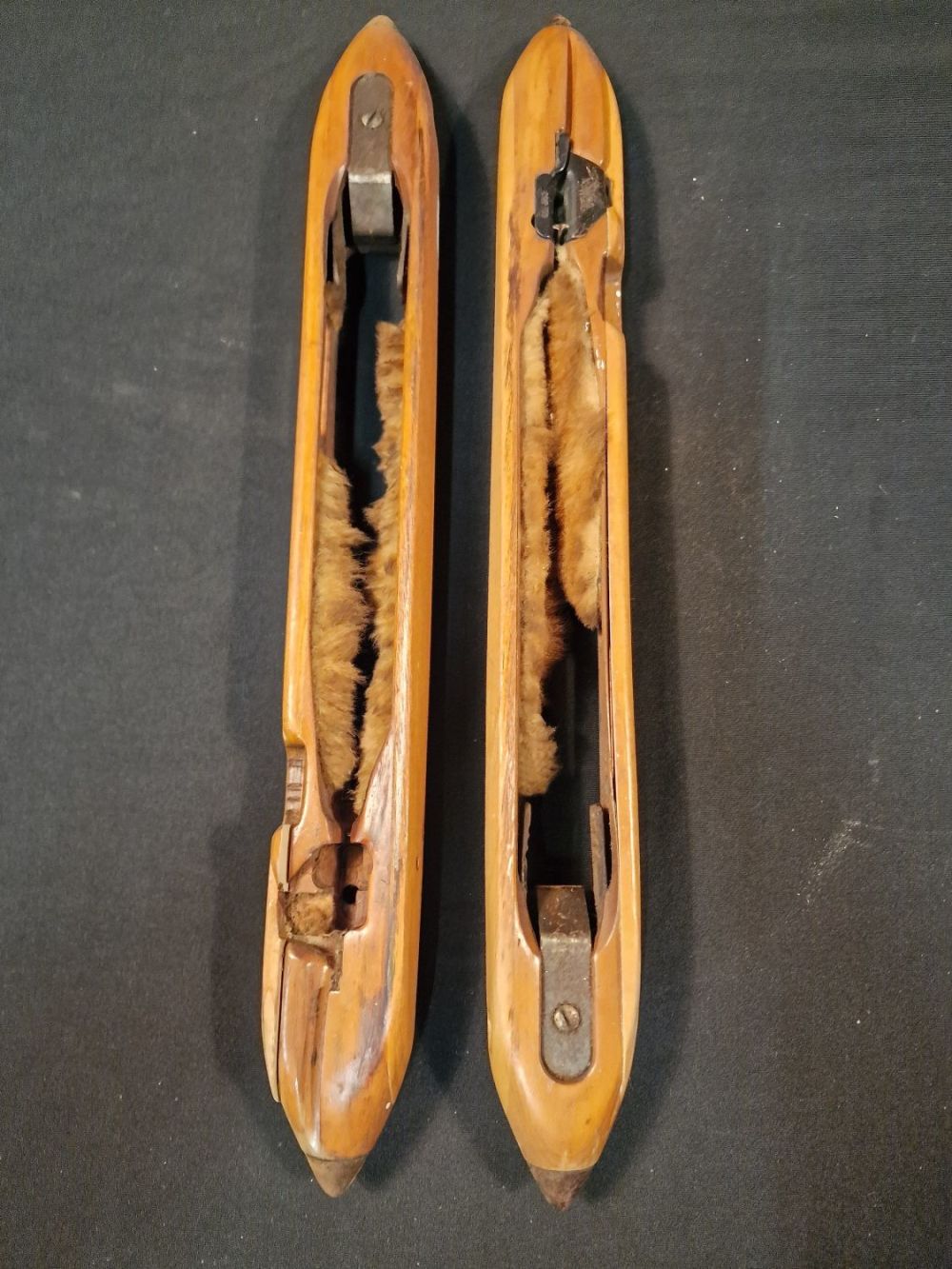 Lot 208: Two antique wooden boat shuttles. Complete with inner...