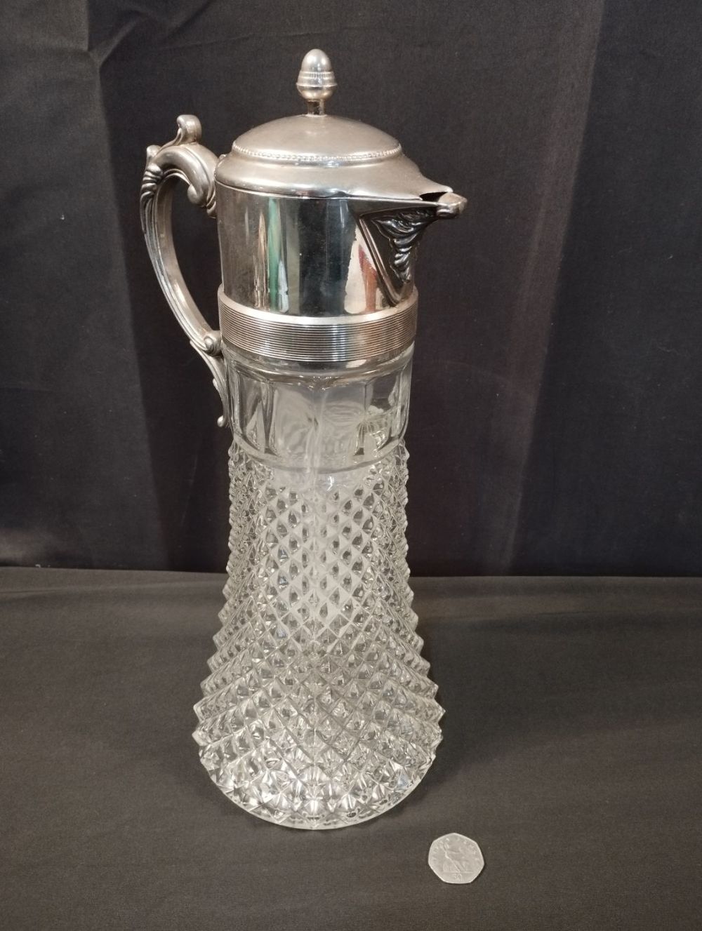 Lot 219: Vintage Silver Plated and Glass Claret Jug.