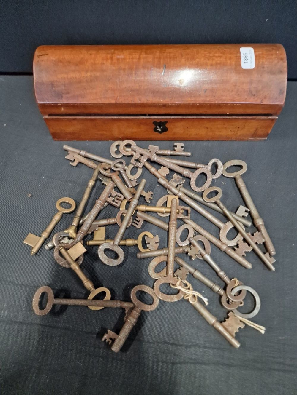 Lot 222: A collection of vintage keys and vintage wooden...