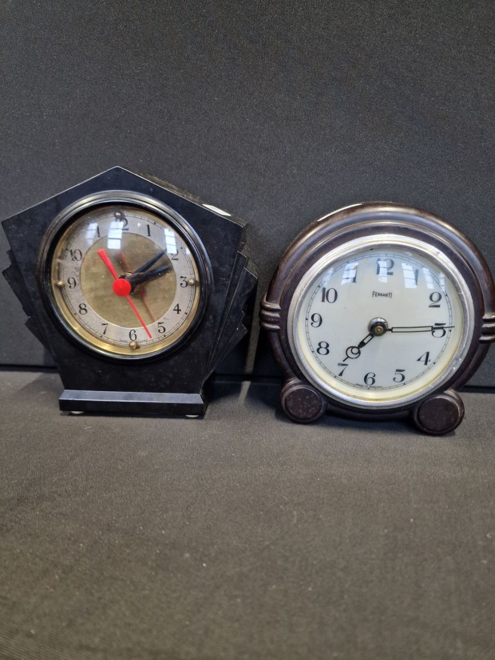 Lot 224: Two vintage art deco Ferranti Bakelite clocks. Black...